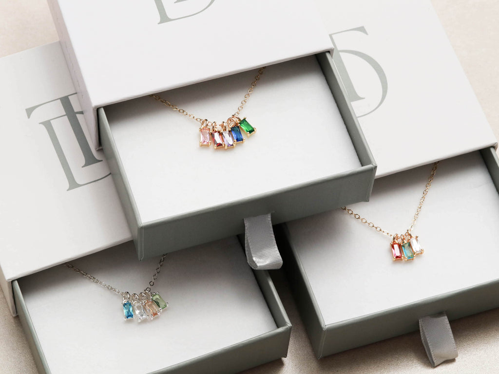 Custom jewelry by Tom Design specializes in creating exquisite solitaire baguette birthstone necklaces.