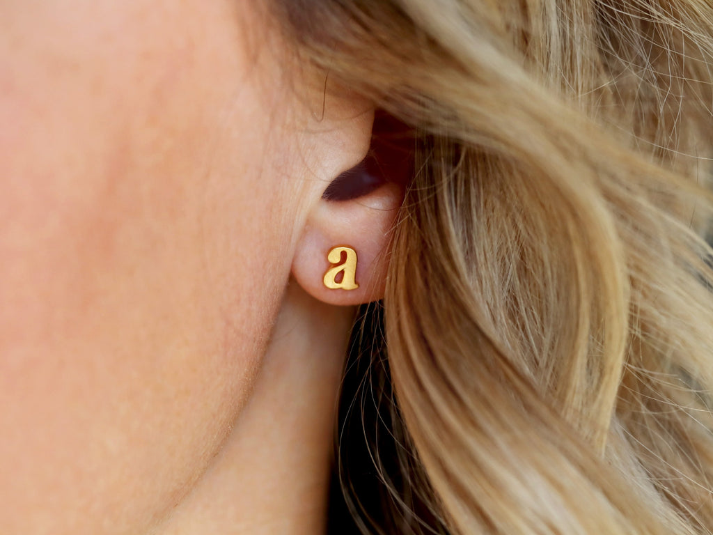Lowercase initial or letter earrings from Tom Design Shop.