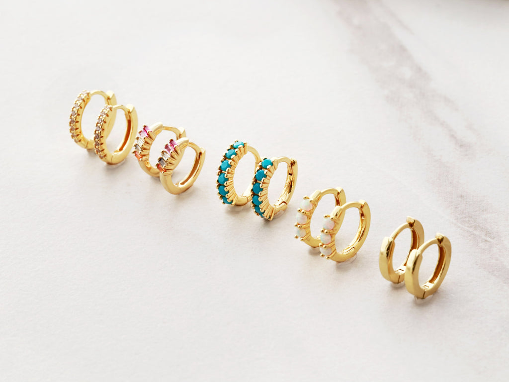 Tom Design Shop offers Huggie Earrings in a variety of styles. Customize your earrings.
