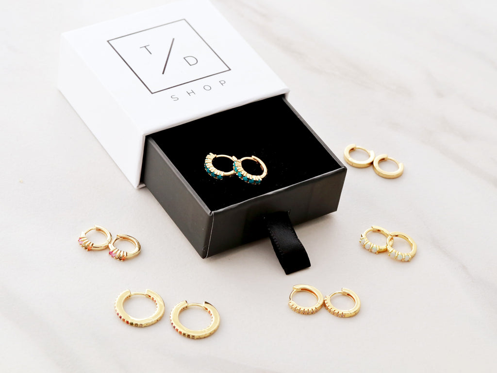 Huggie Earrings in gold, silver, or rose gold are the perfect gift from Tom Design Shop.