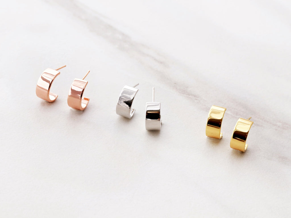 Silver, Gold, and Rose Gold Thick Hoop Earrings from Tom Design Shop.