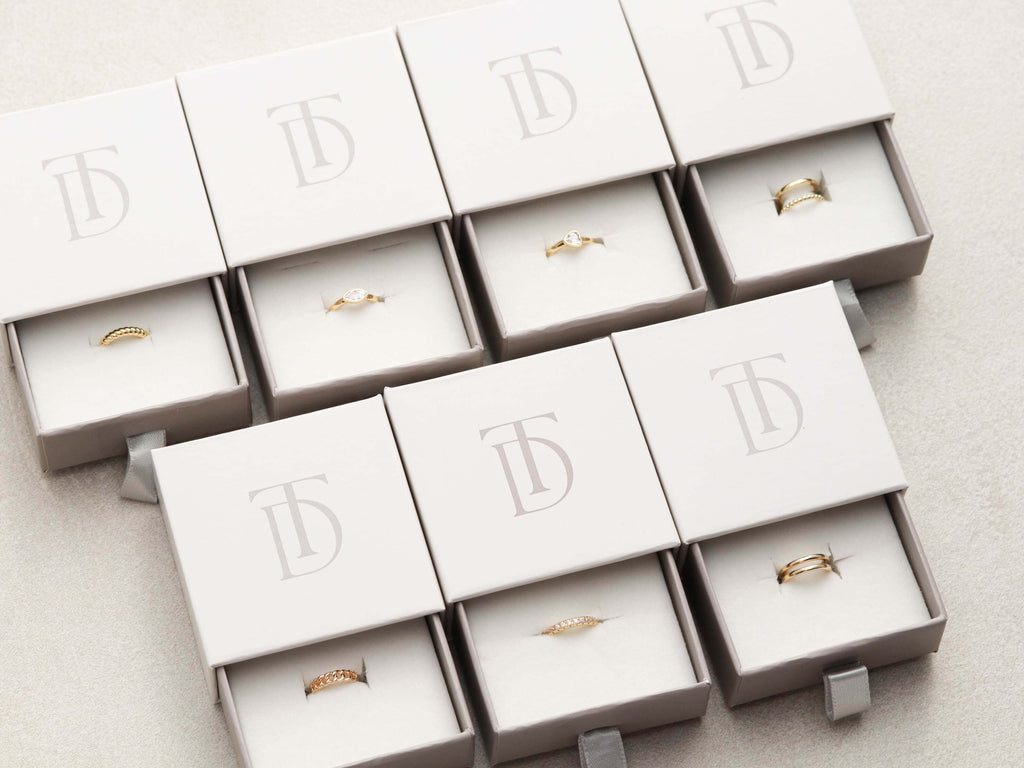Custom gift packaging with earring cuffs by Tom Design Shop.