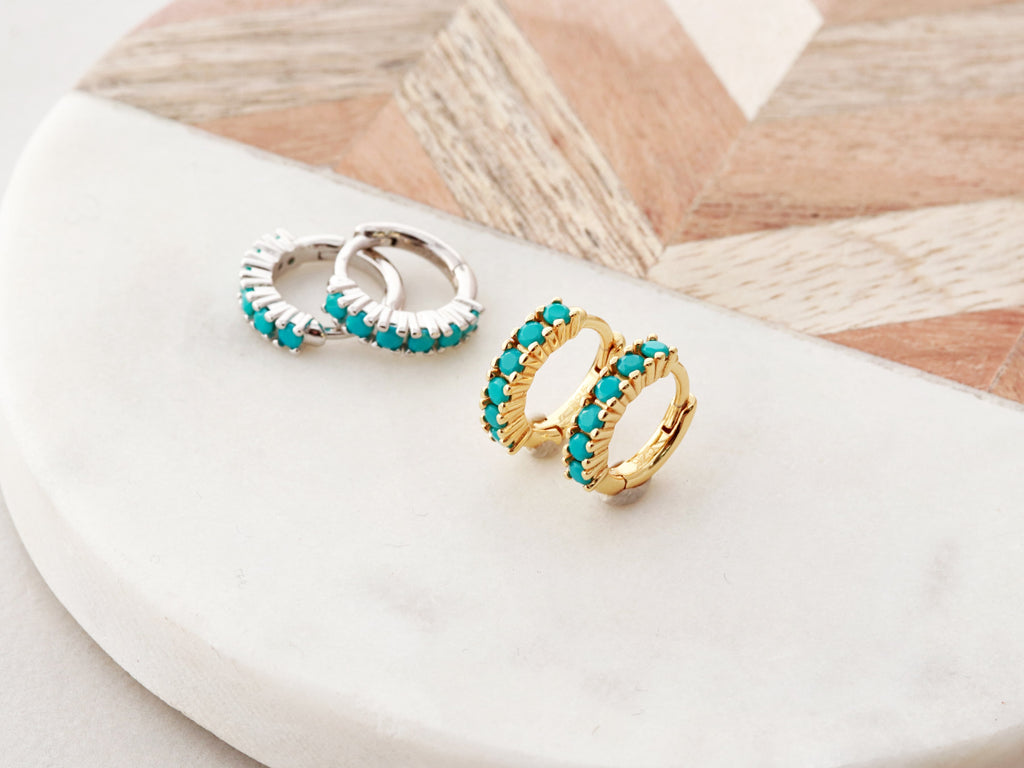 Turquoise Huggie Earrings in gold and silver from Tom Design Jewelry.