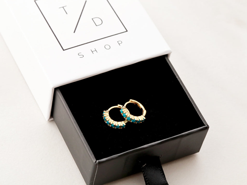 Tom Design Gift Boxes are the perfect touch for the Turquoise Huggie Earrings.